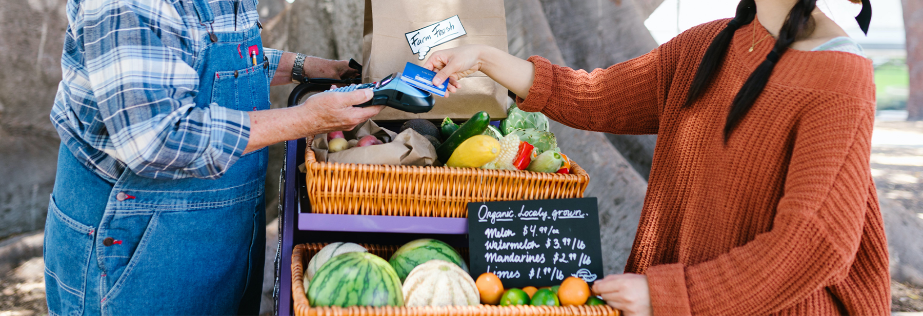 Exchange of Goods and Payment at Farmer's Market