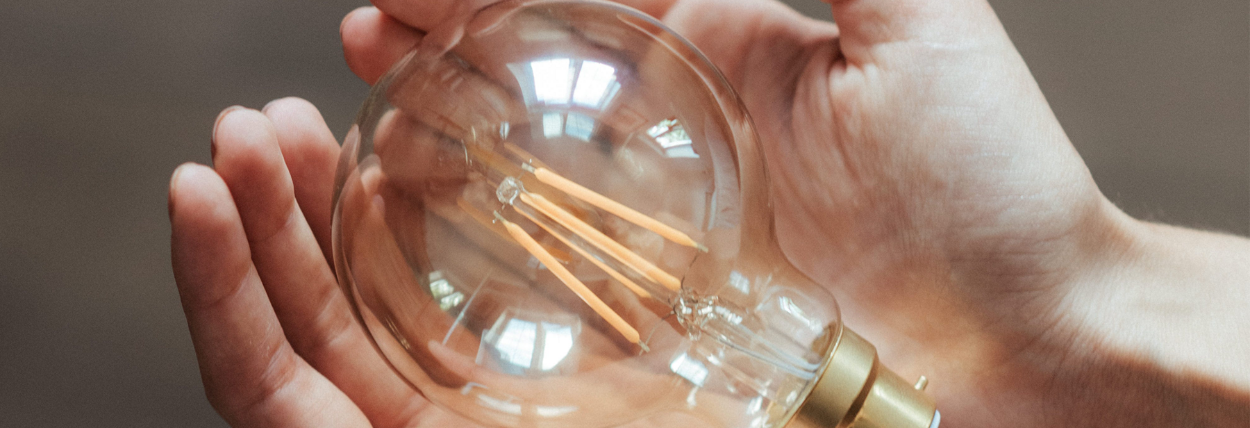 Lightbulb in hands